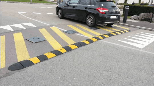 Car crossing a speed bump