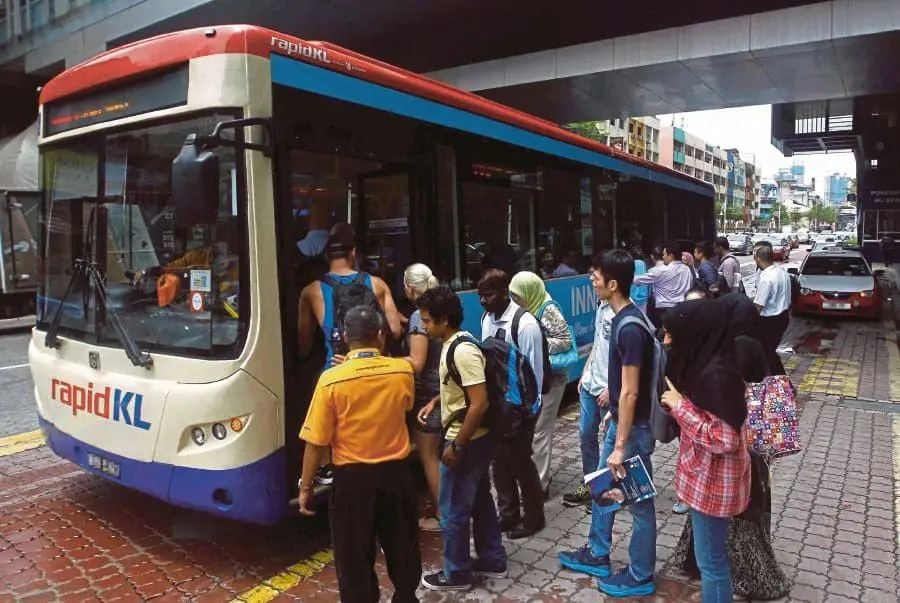 Passengers boarding a RapidKL bus