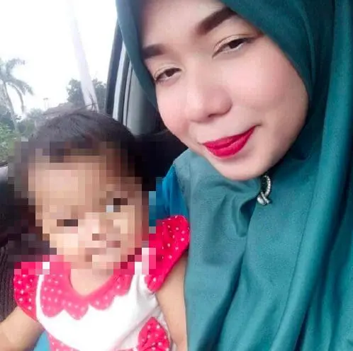 11-month-old baby Zara and her mother