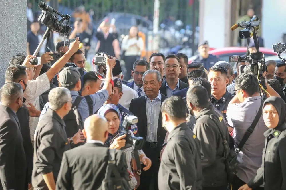 Muhyiddin Yassin arriving at KL court