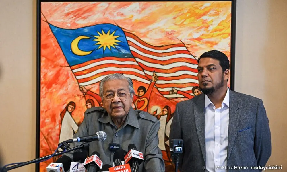 Mahathir Mohamad speaking at a press conference