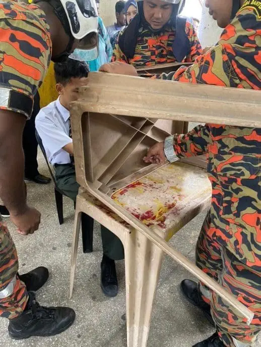 Firefighters help free M'sian student's finger from the desk