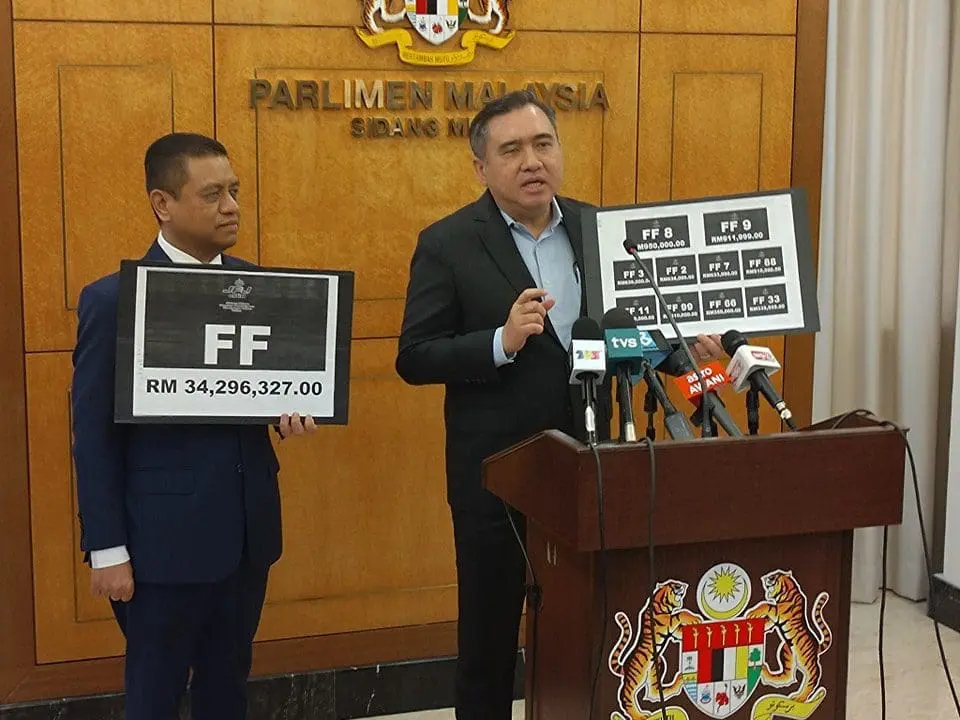 Anthony Loke showing the FF number plate series.
