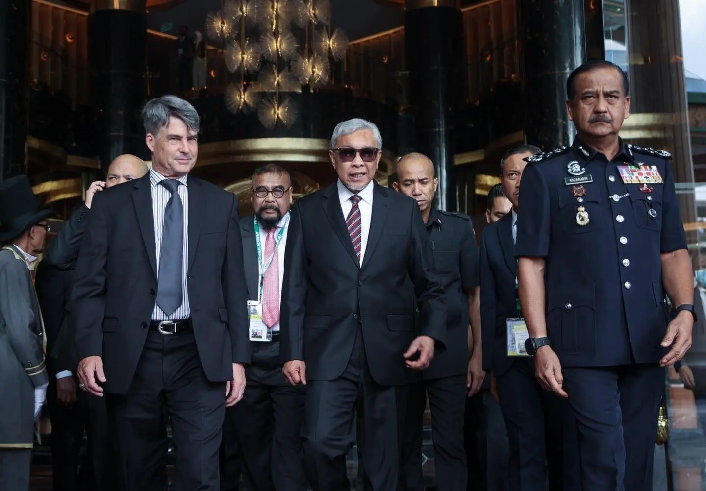 Zahid Hamidi in sun glasses with the VIPs
