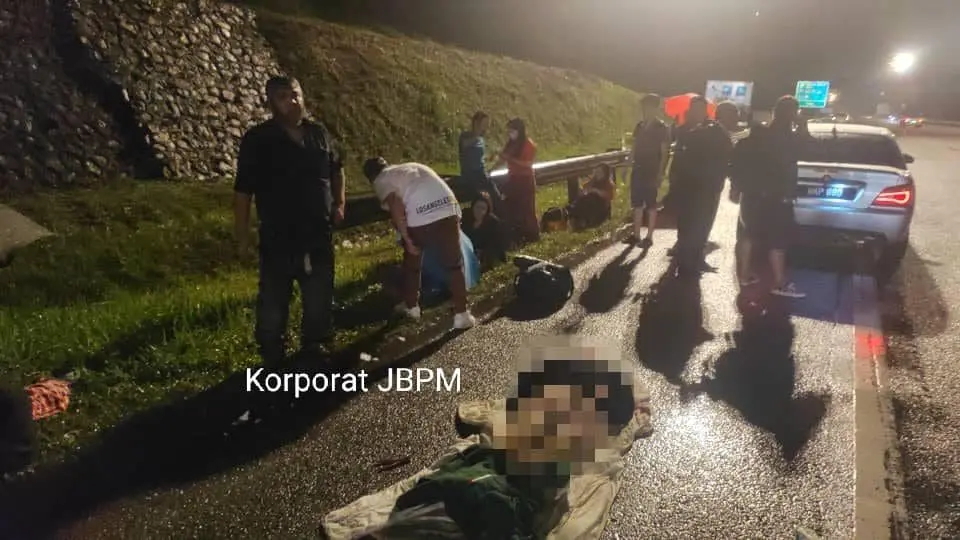 Tour Bus Heading Towards KL From S'pore Collides With Car On North-South Expressway, Killing 2