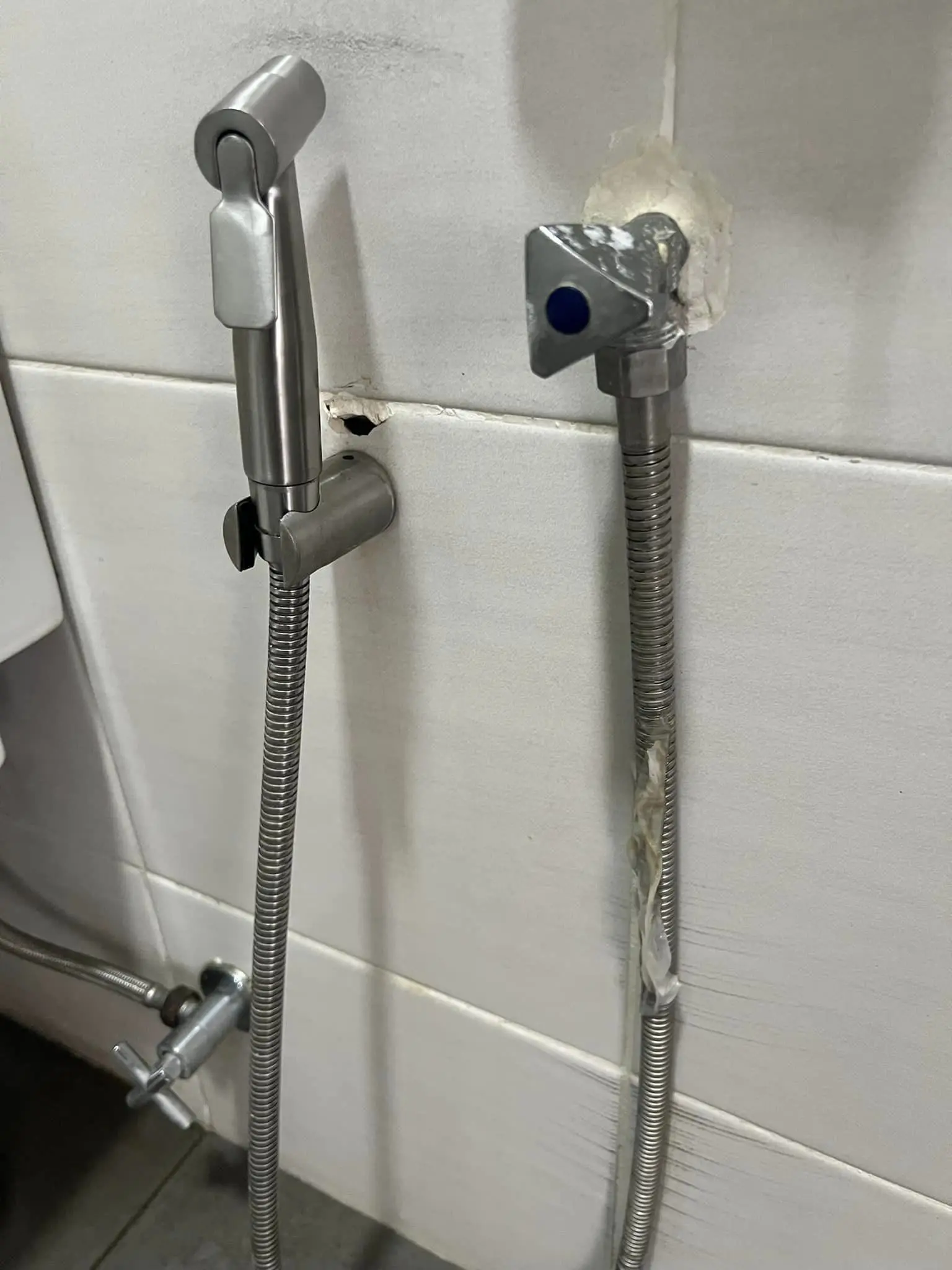 Condom plastered on bidet 