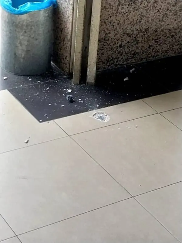 Debris from the damaged floor inside Maybank in Jason Melaka.
