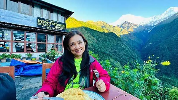 Zhang Ruixin having meal at a mountain