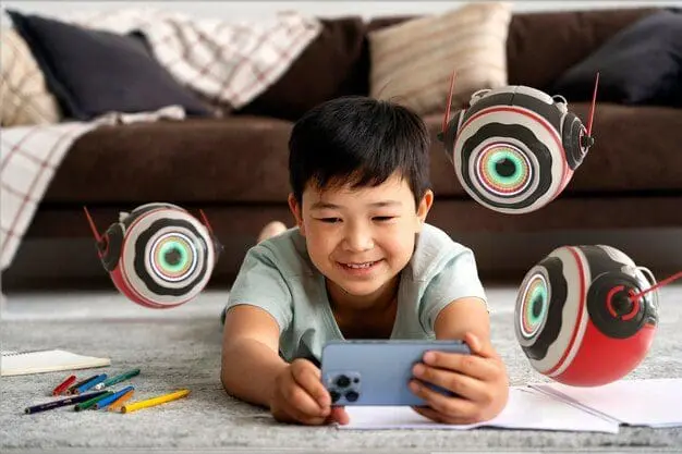 Asian boy playing with iPhone