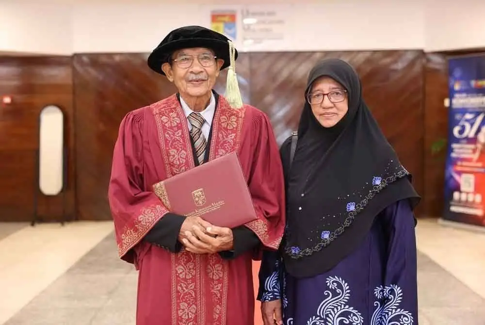 79yo Dr Muharam Awang and his wife