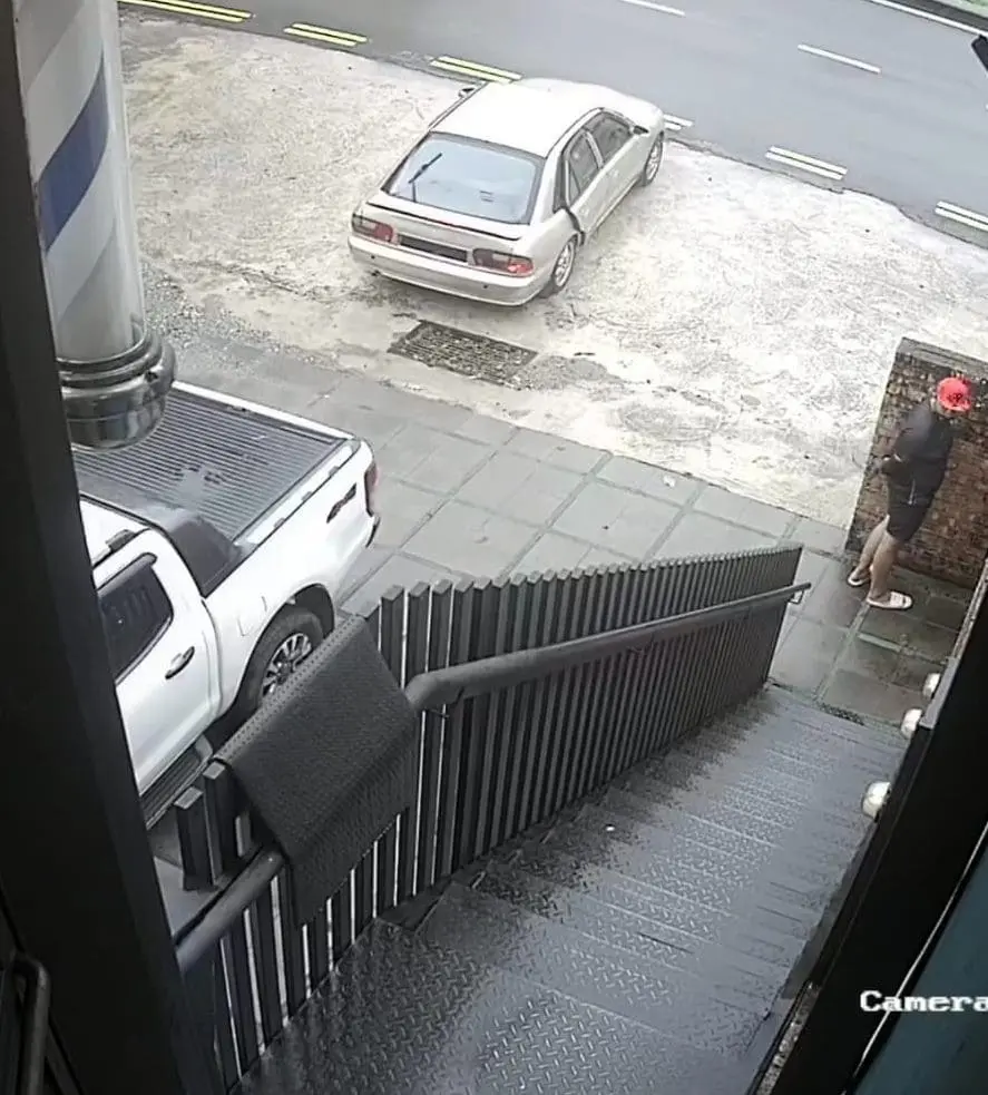 Lin's business partner seen loitering outside workshop