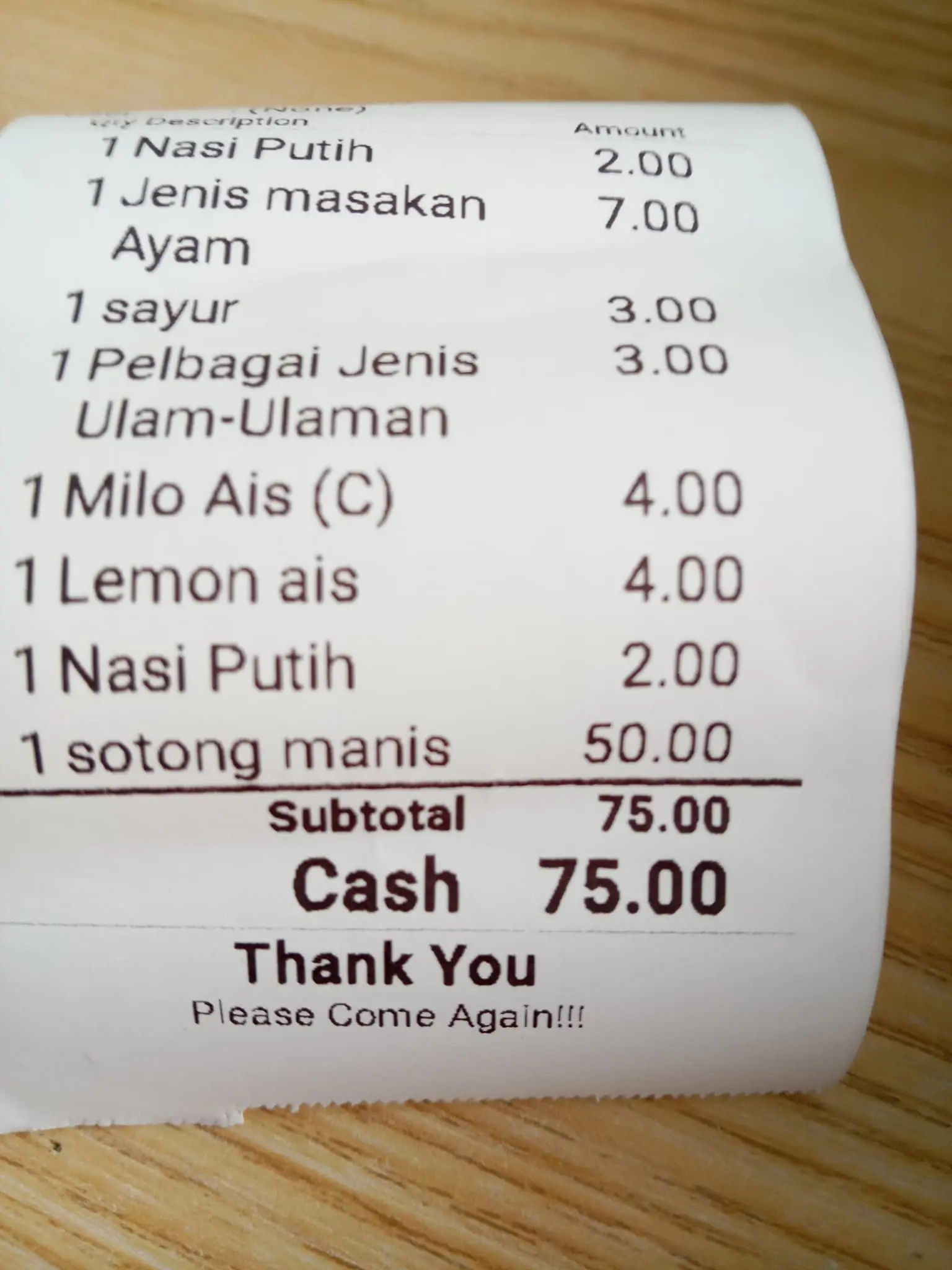 Receipt showing RM50 for each piece of squid