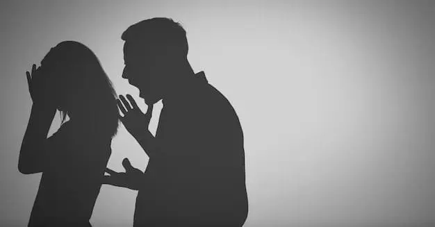 Man yelling at a woman in black and white