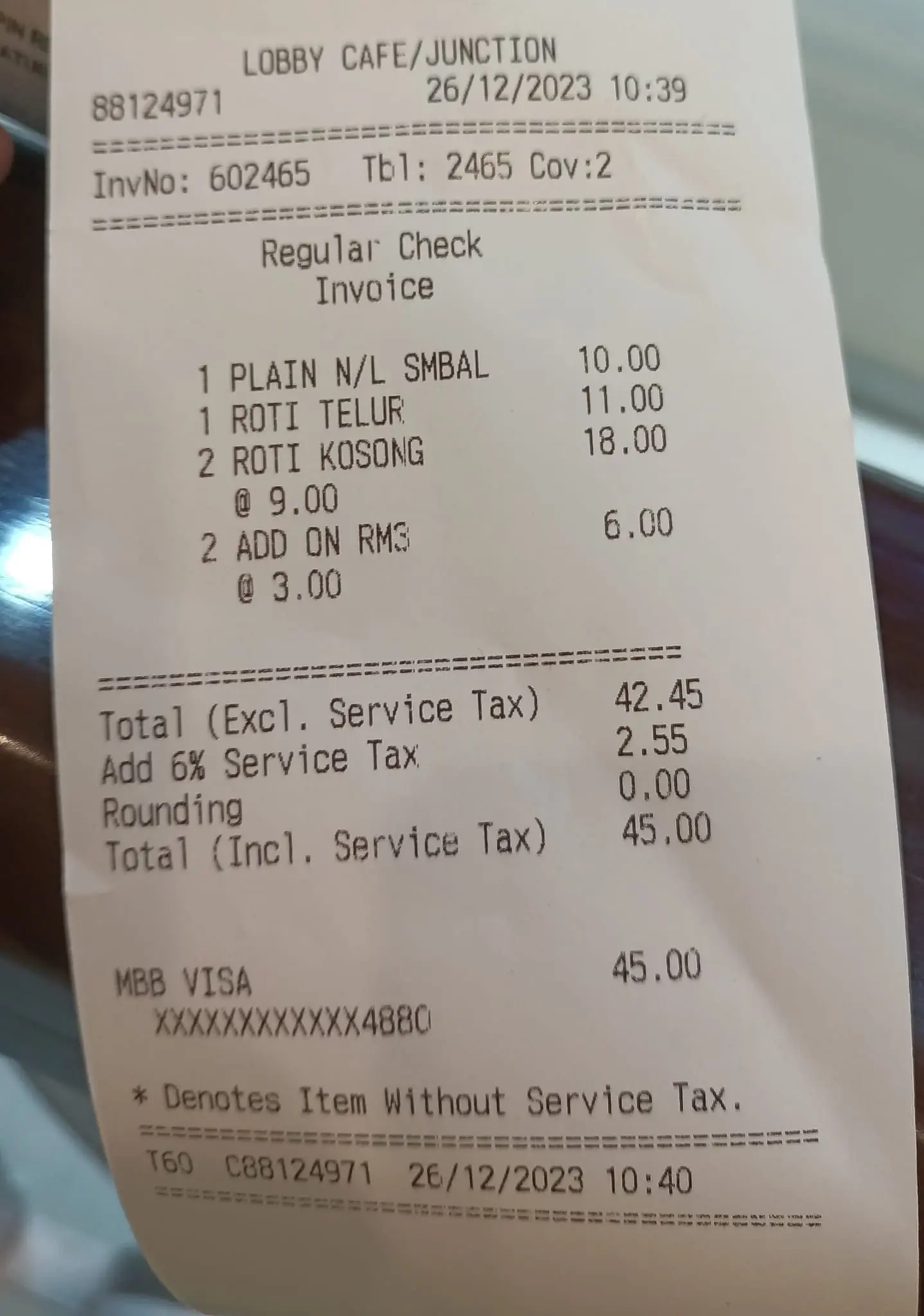 Receipt showing 2 pieces of roti canai being priced at RM18