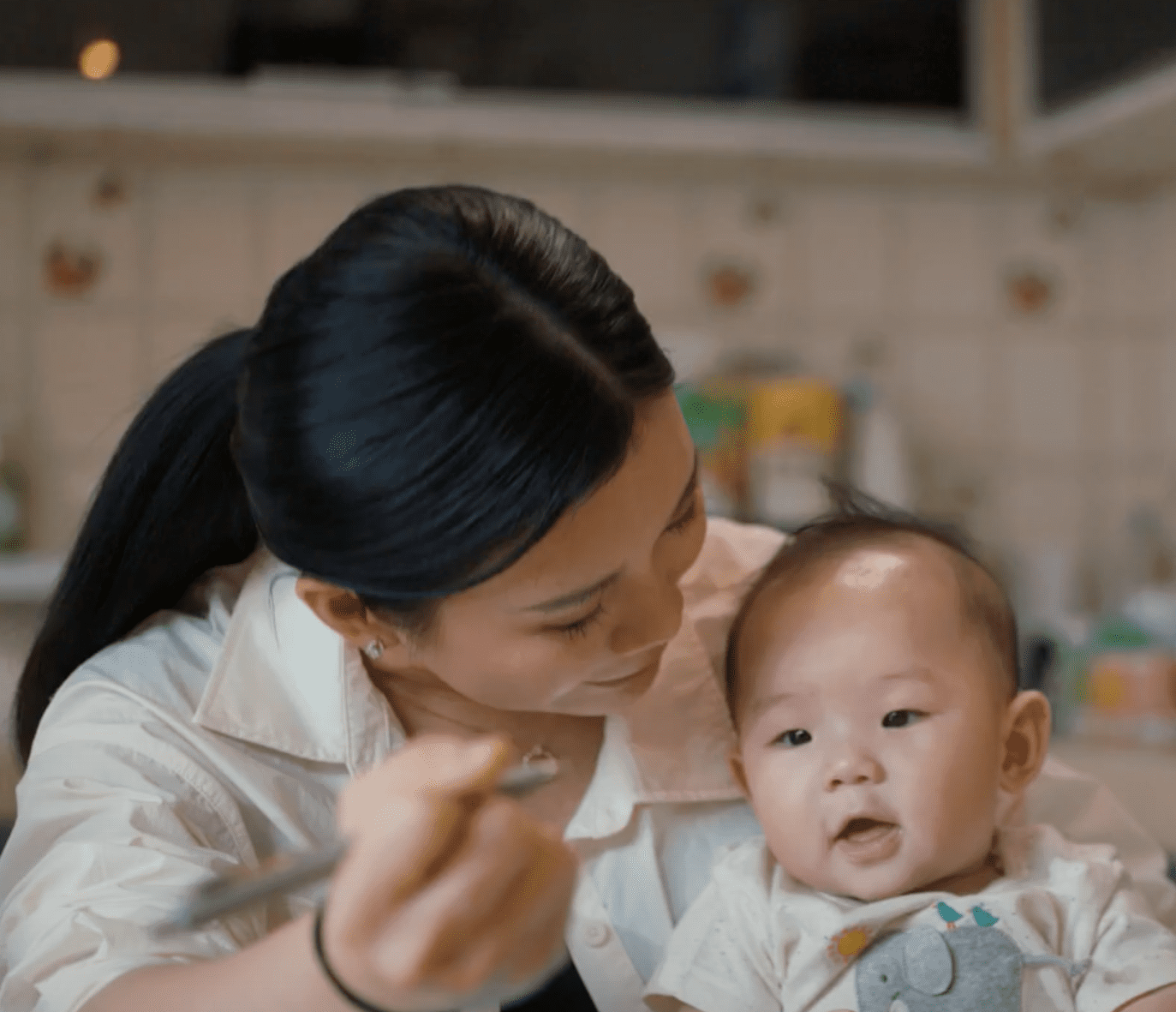 Goh Liu Ying and son