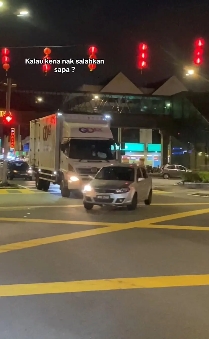 Car cutting lorry's lane