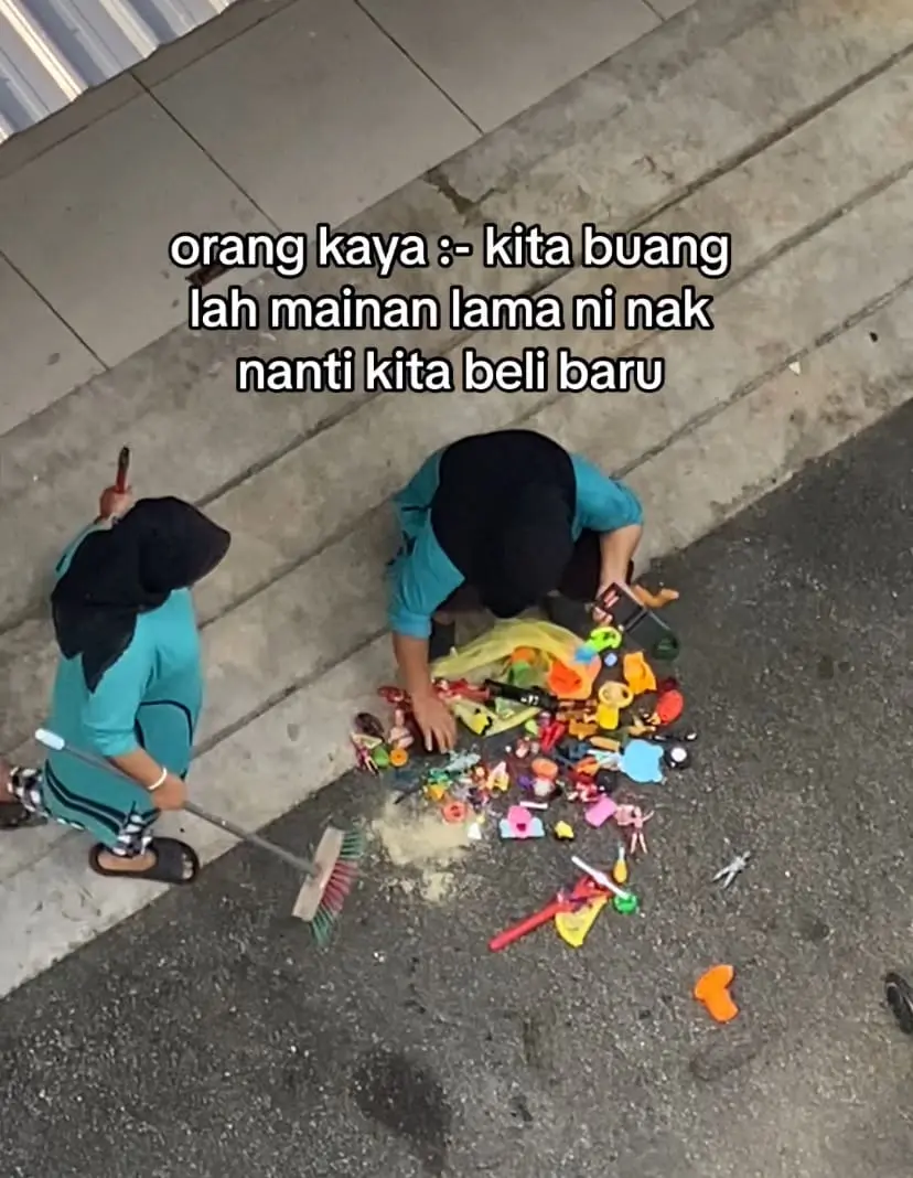 Janitor collecting toys from trash site