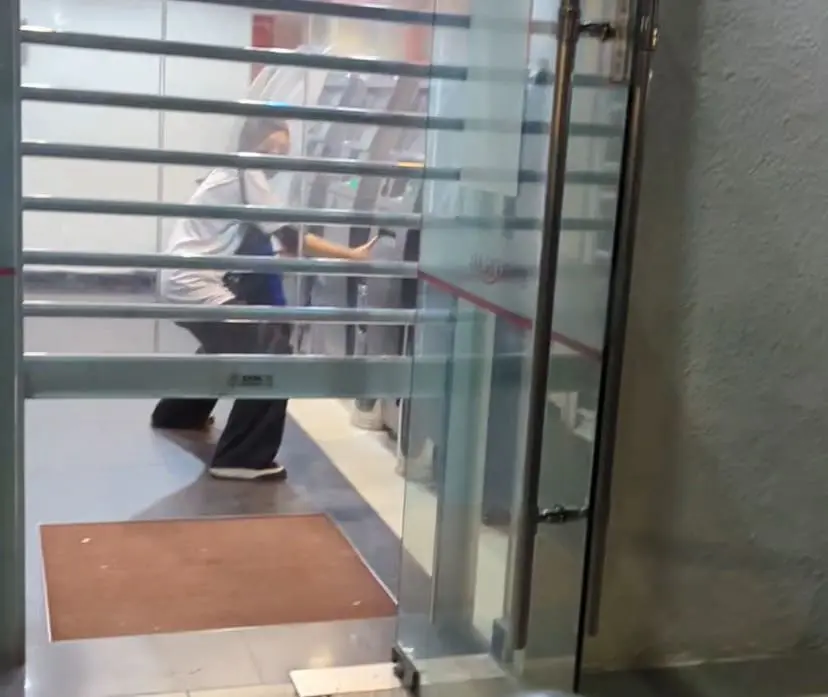 woman stuck inside bank