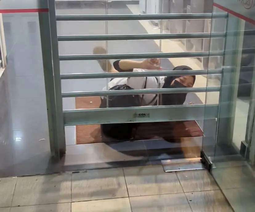 woman stuck inside bank