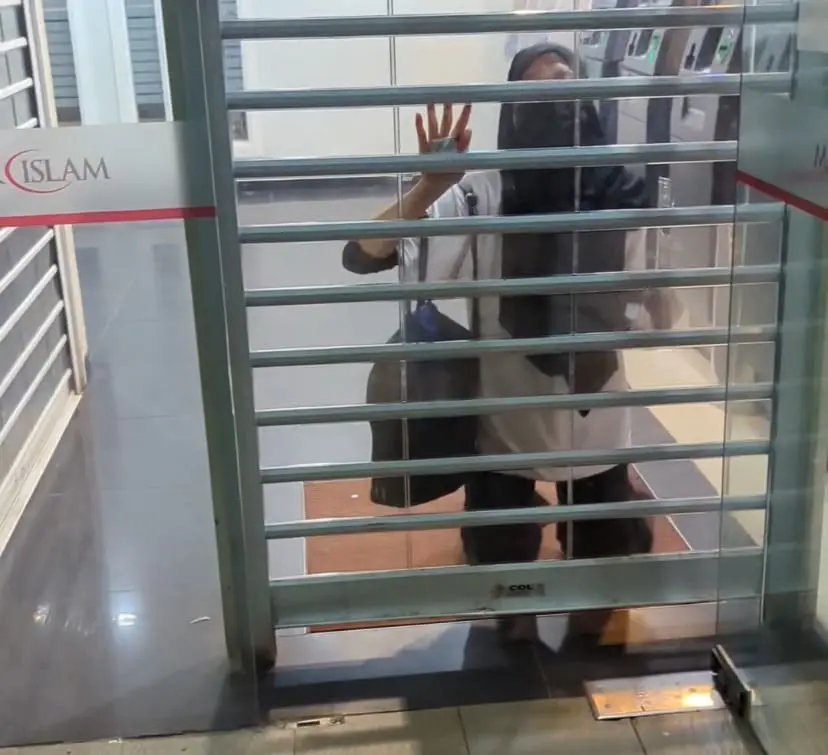 woman stuck inside bank