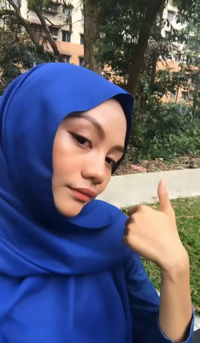 Zahirah a Malaysian woman who is calm after her door car destroyed by robber