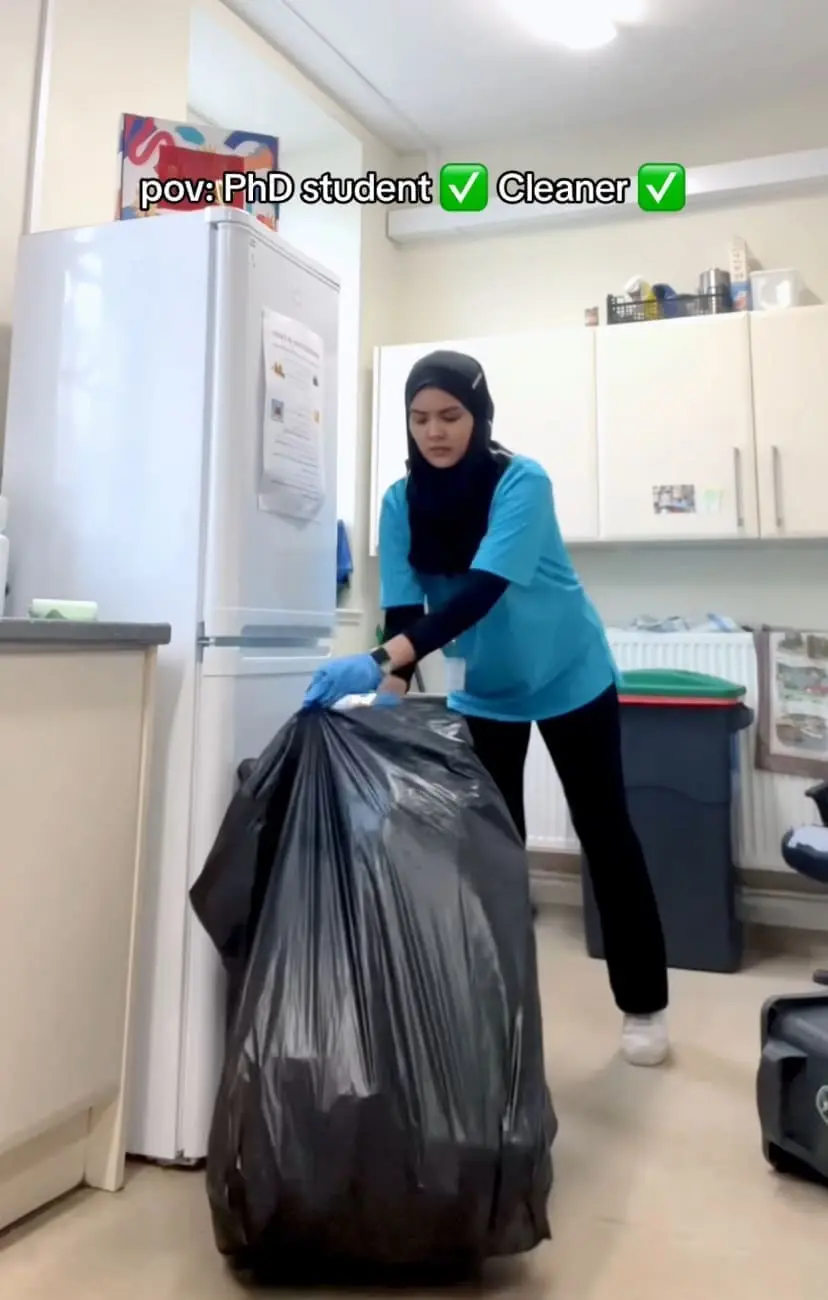 Izzah, Malaysian PhD student in the UK who does part time job as cleaner.