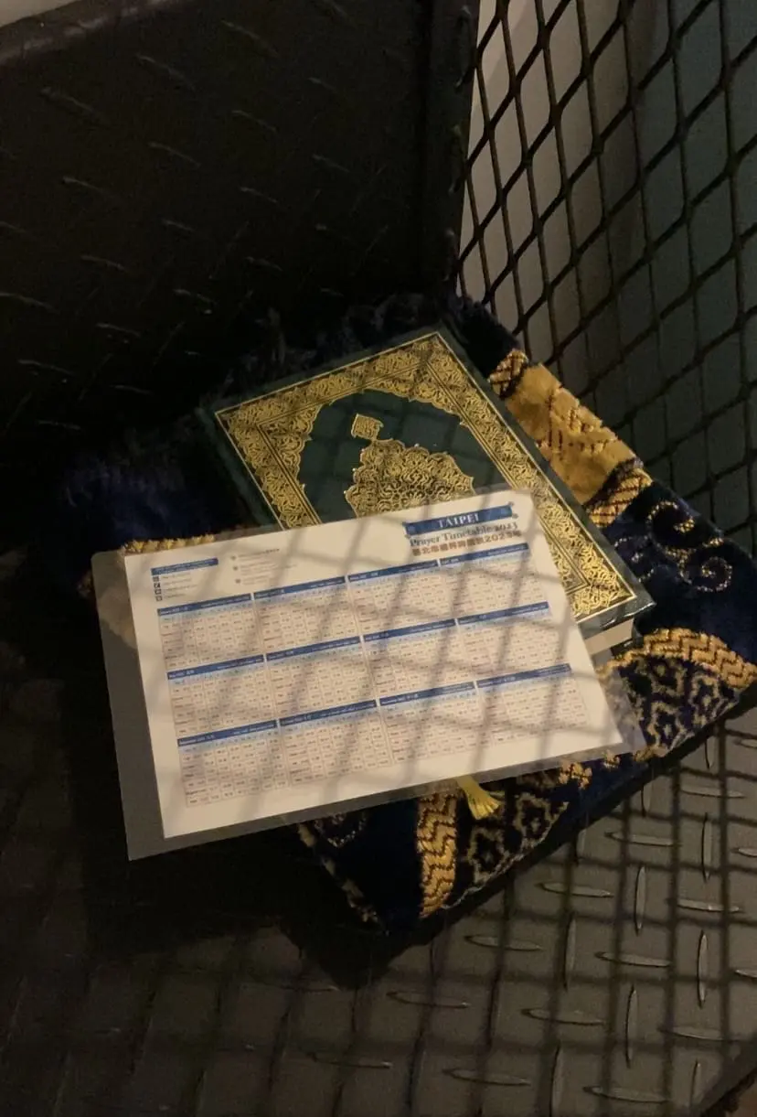 Quran and praying mat