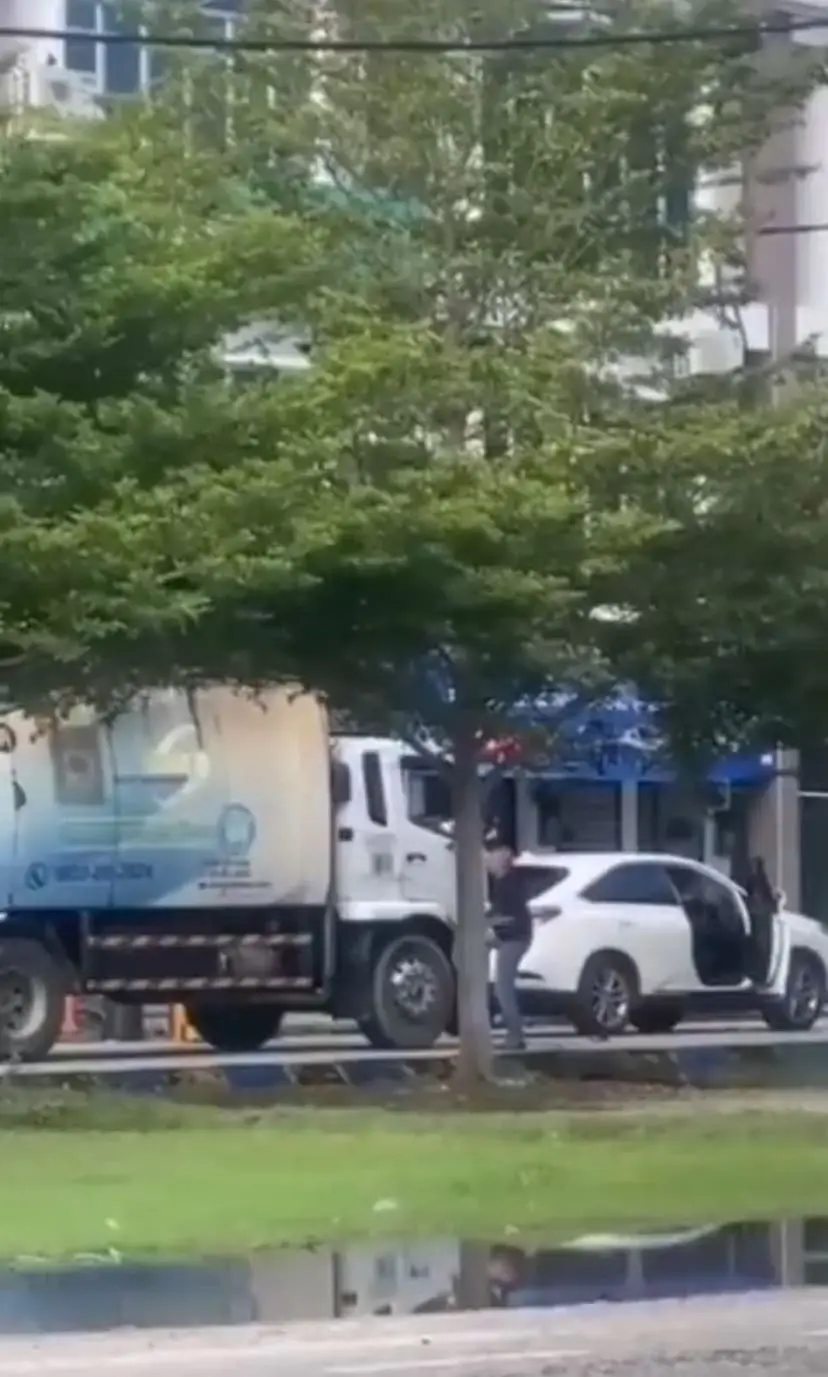 man arguing with garbage truck driver