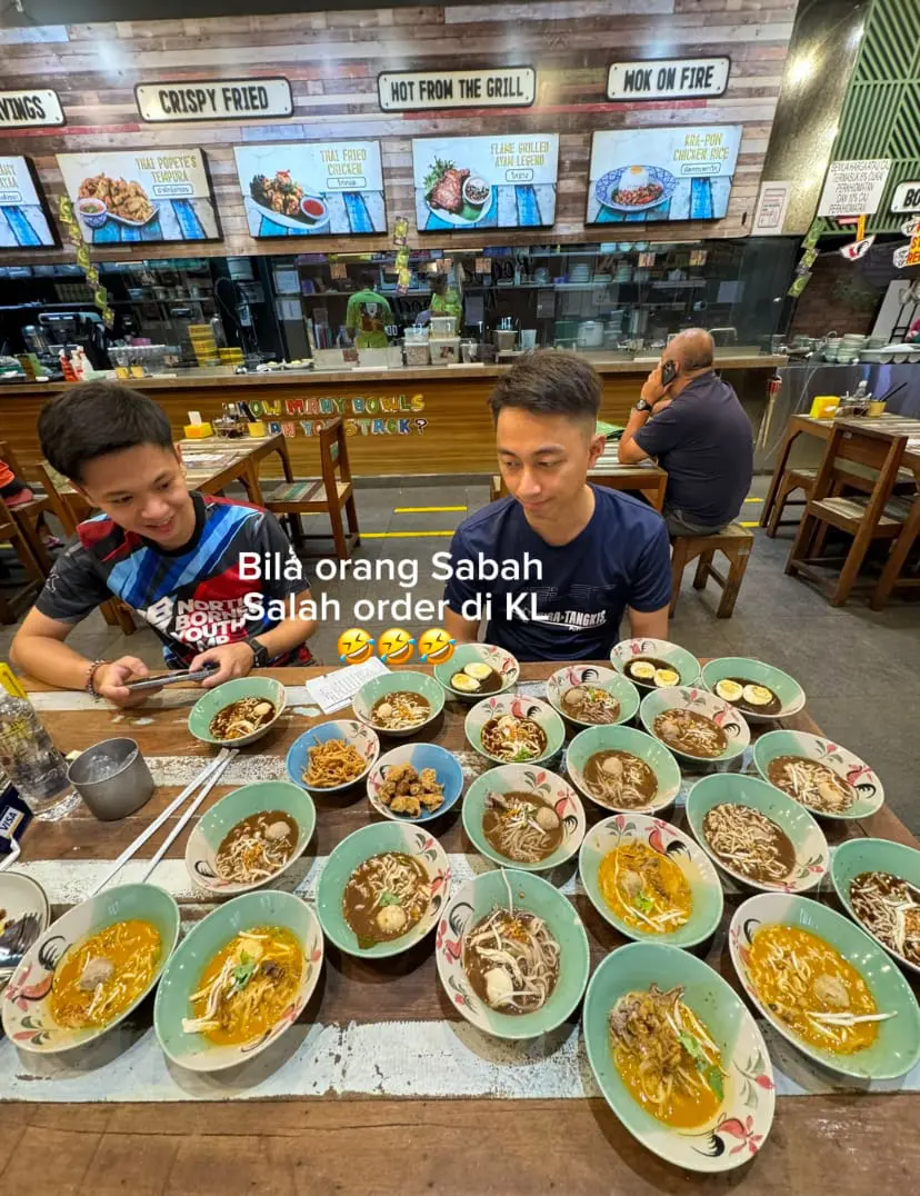 Tommy and friends at Boat Noodle with 28 bowls