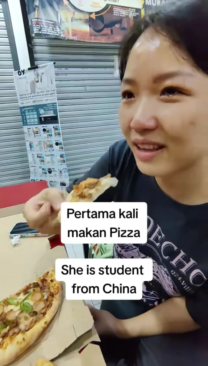 China student in tears after eating a slice of pizza