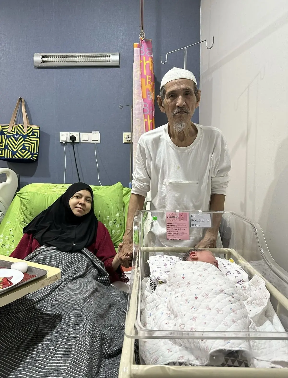 Pak Yob, 80 and Ummi Mak Ha 42 welcome their first child after 10 years of marriage