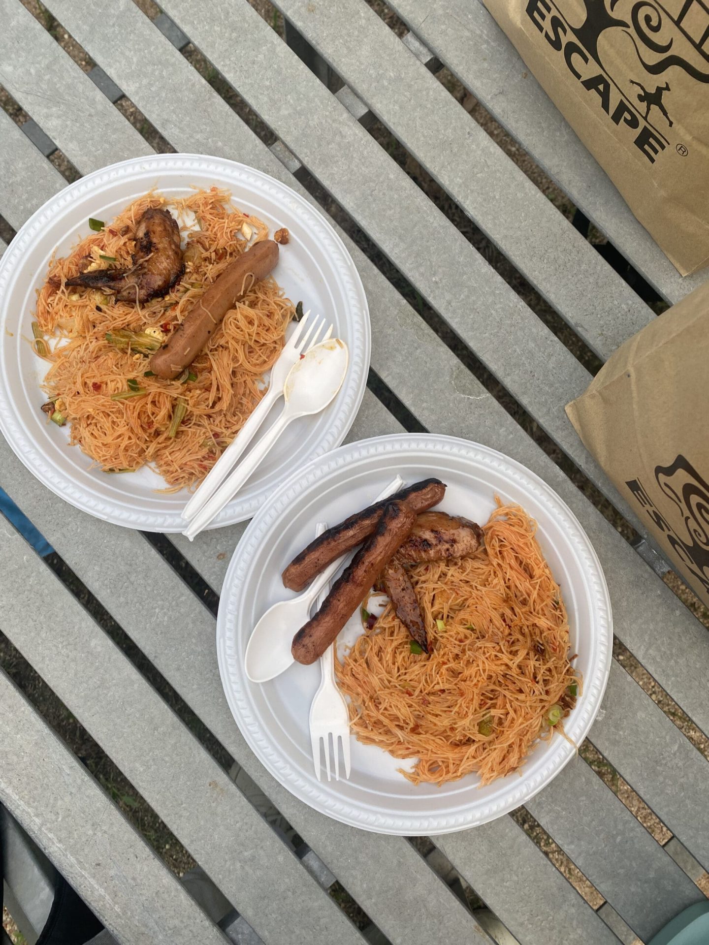 Eating bun and hot dog at ESCAPE Penang