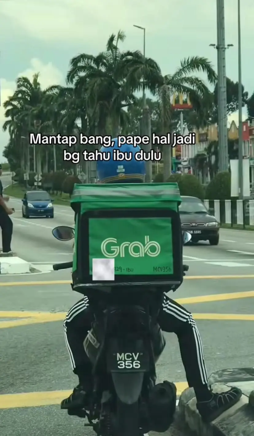 A closeup of his bag with his mother's phone number on it incase anything happens to him