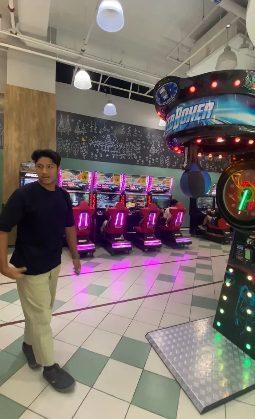 Man punches at arcade