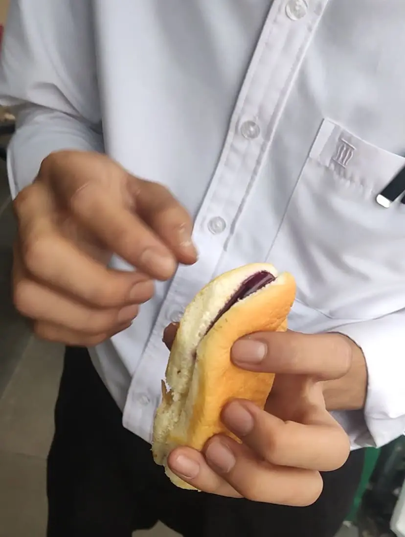 RM12 bun with little purple jam on the edge