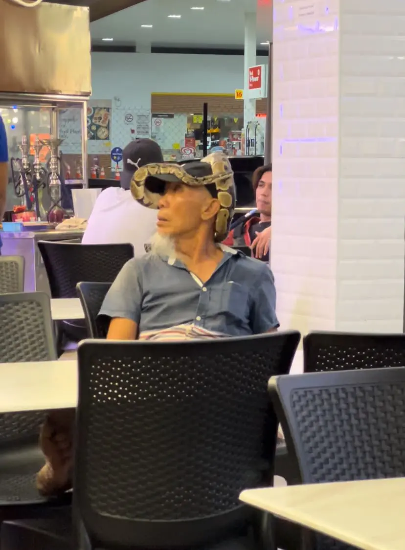 relaxed uncle has snake in his head - July 2024