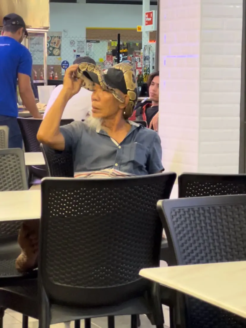 relaxed uncle has snake in his head - July 2024