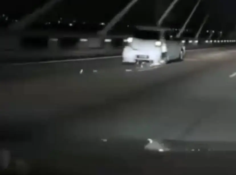 axia with severe dents and missing rear tire on penang bridge