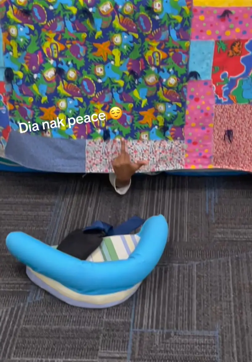 Offensive gesture - middle finger, showcased by elementary school student 