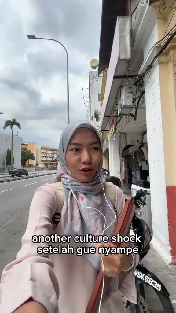 indonesian student working on the street