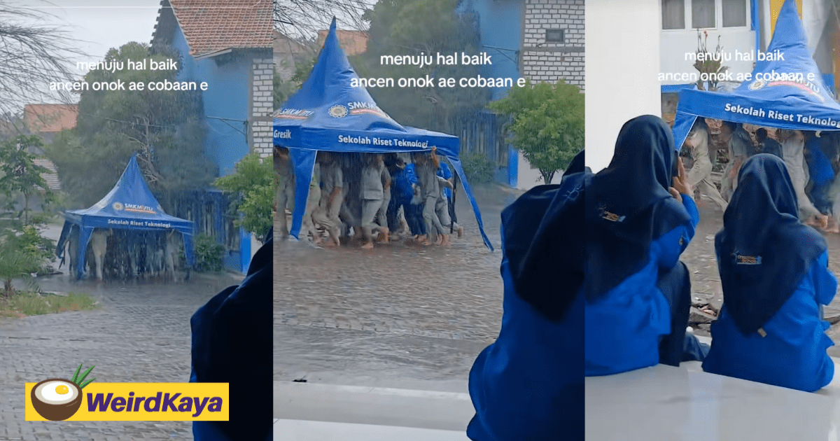 Indonesian Students Shield Each Other From Rain With Tent, Making It The Ultimate Group Project