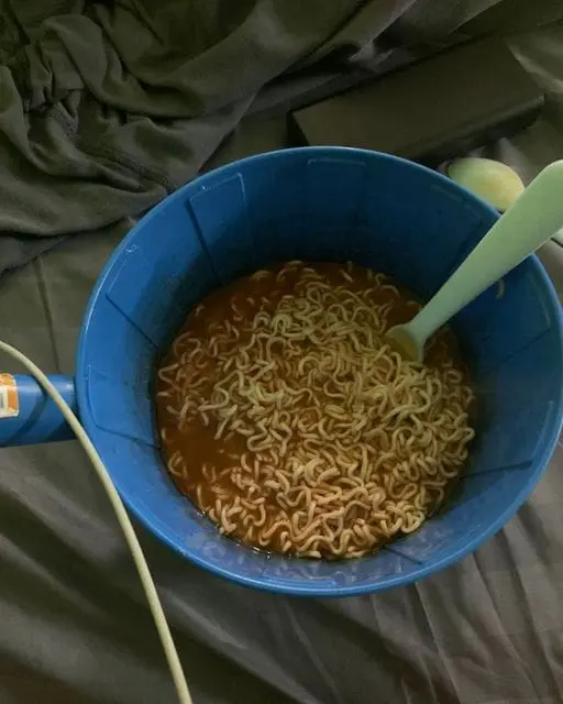instant noodles in water ladle