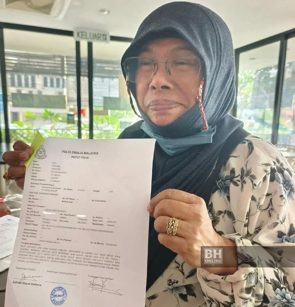 Datuk Jabidah Monseri shows police report