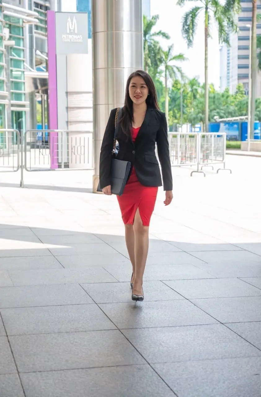 Jia Li working in a corporate job