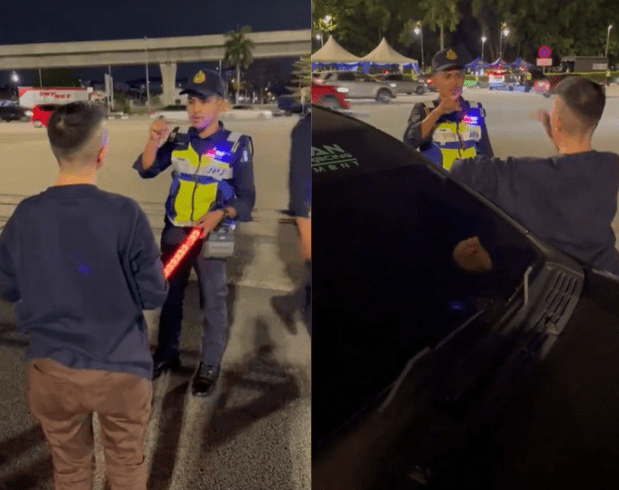 JPJ officer speaking to deaf driver with sign language