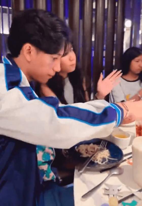 Kak KM's family having a meal