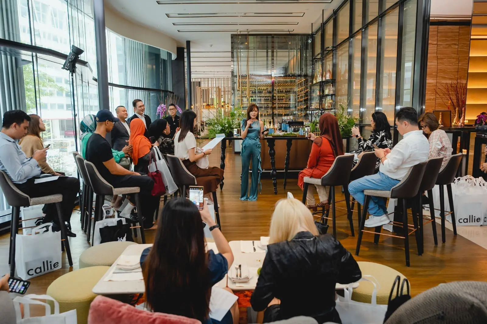 Kelly Teoh of Callie giving speech about XOSOME