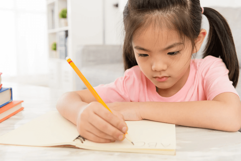 kid writing notes