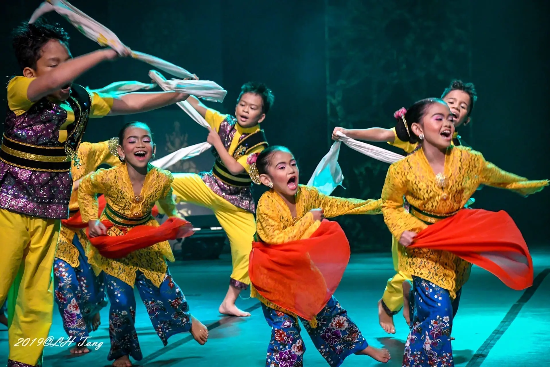 kids performing on stage