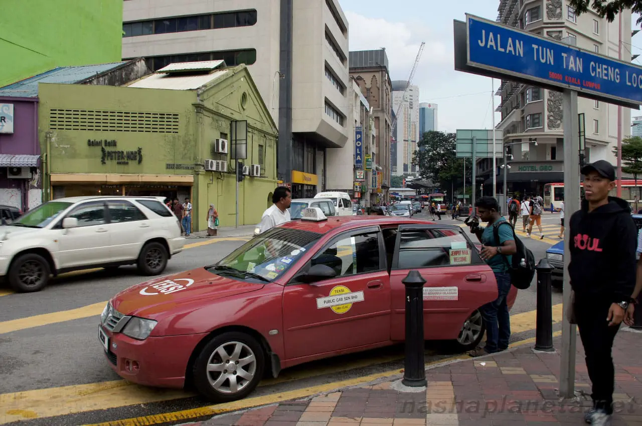 A passenger taking taxi
